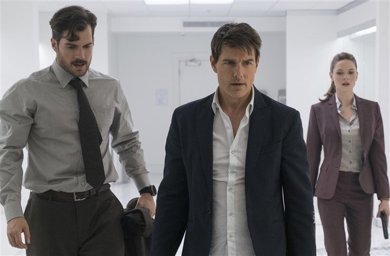 Henry Cavill, Henry Cavill's mustache, Tom Cruise, and Rebecca Ferguson in Mission Impossible: Fallou