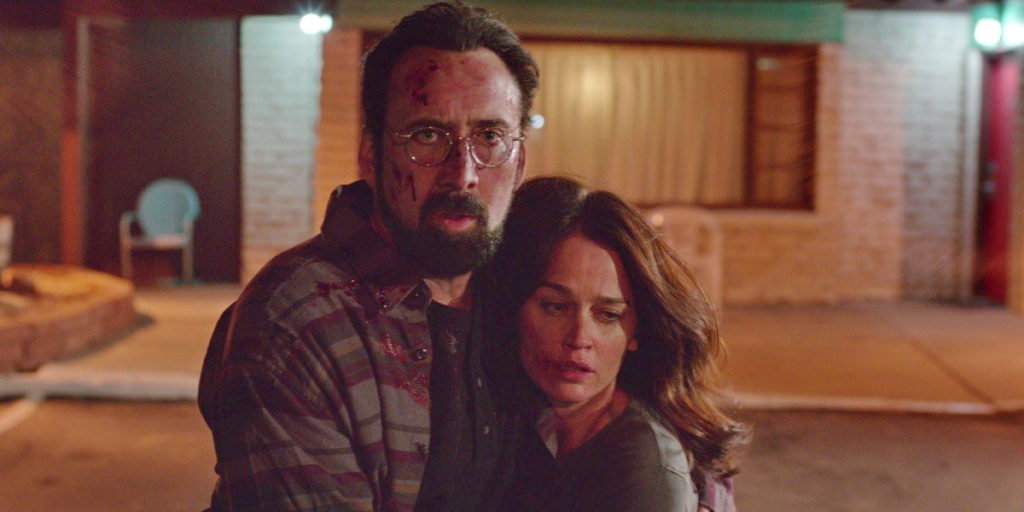 Nicolas Cage and Robin Tunney in Looking Glass